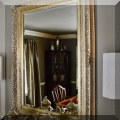 DM03. Gilt mirror with beveled glass. 46”h x 34”w 